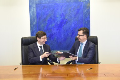 José Ignacio Goirigolzarri y Román Escolano firman el acuerdo