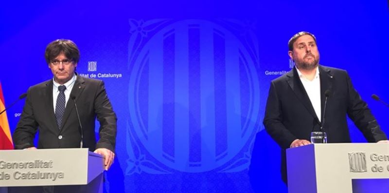 Carles Puigdemont y Oriol Junqueras